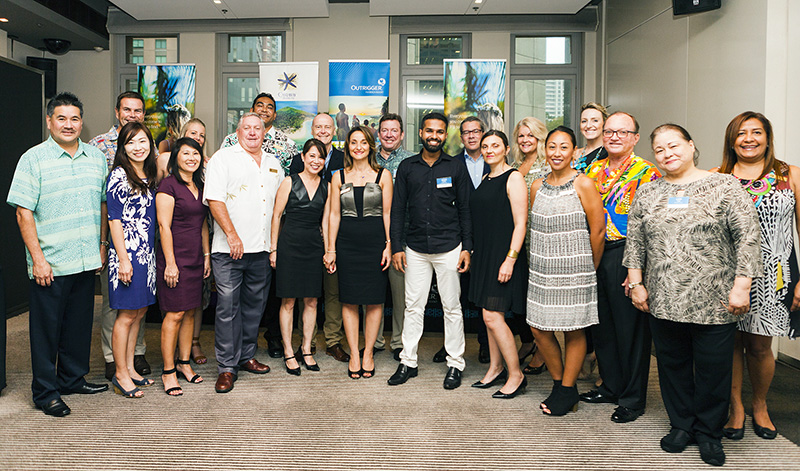 Outrigger Resorts' COO Paul Richardson, Executive VP and Chief Marketing Officer, Sean Dee and VP Sales and Marketing Asia Pacific Mark Simmons back centre with global sales and marketing team