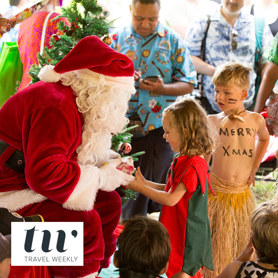 Santa’s splashdown at Outrigger Fiji begins a day of family celebrations and entertainment